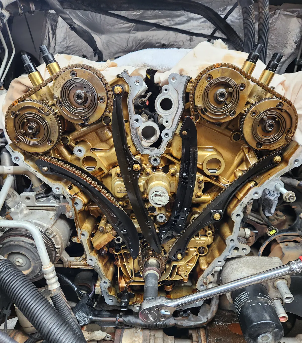 Engine with the timing cover off, cams locked for a timing chain job